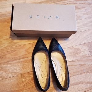 Worn twice. Women's shiny black flats with pattern